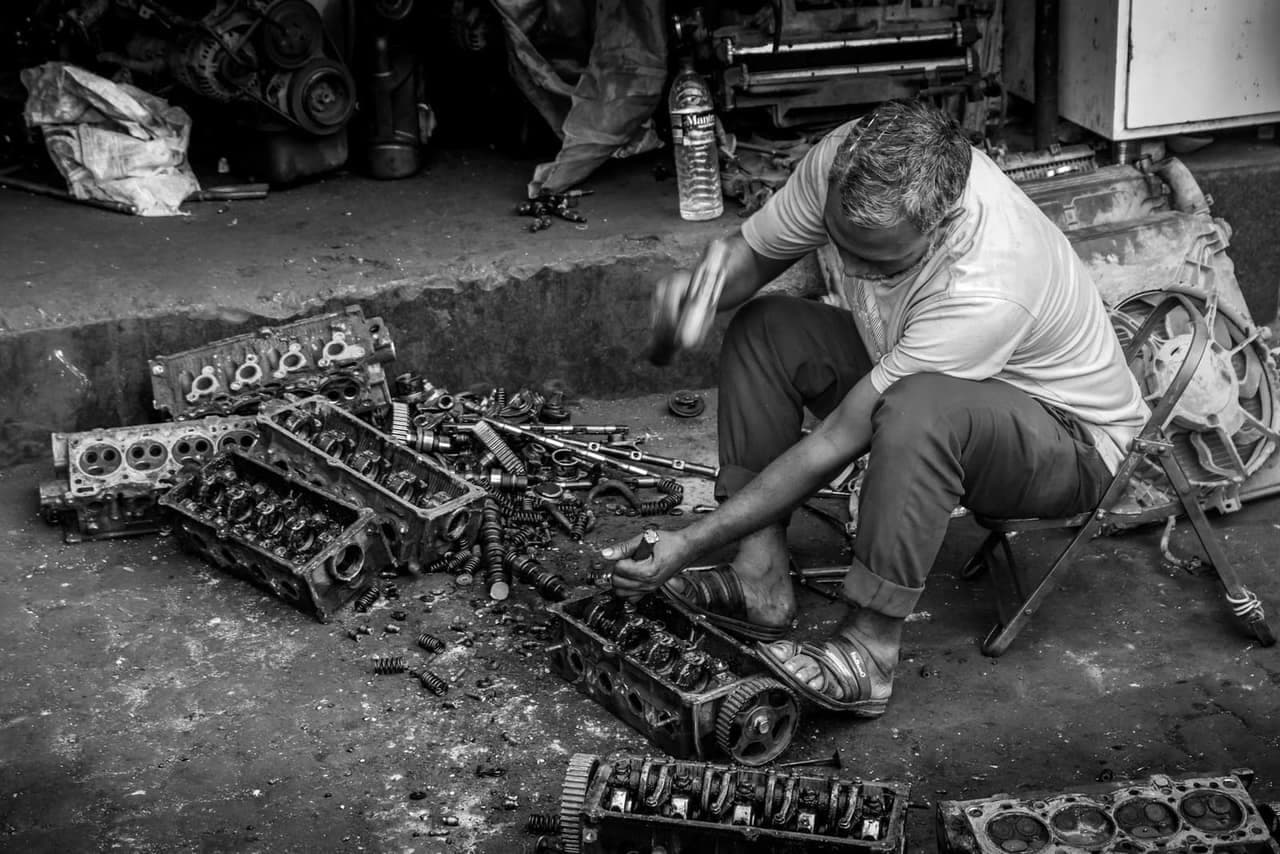 Mechanic working on a car